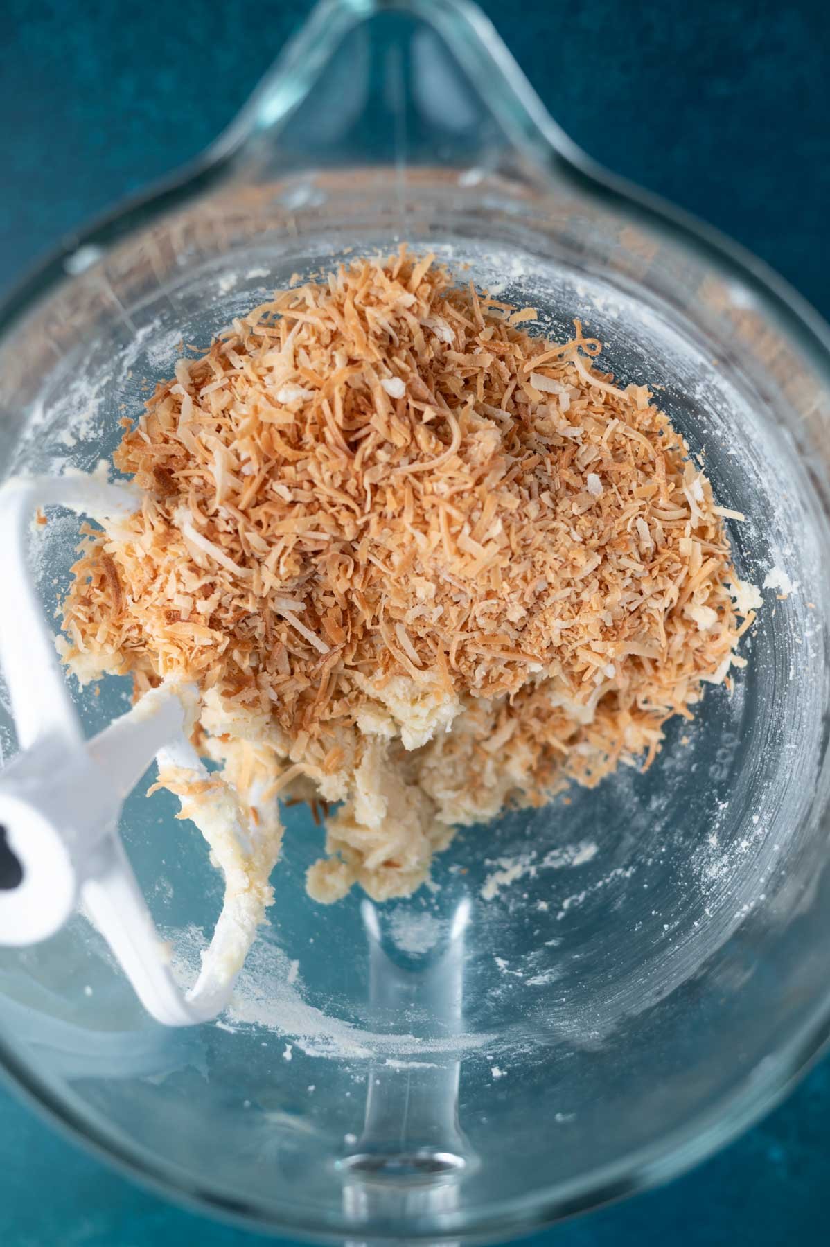 toasted coconut added to mixing bowl