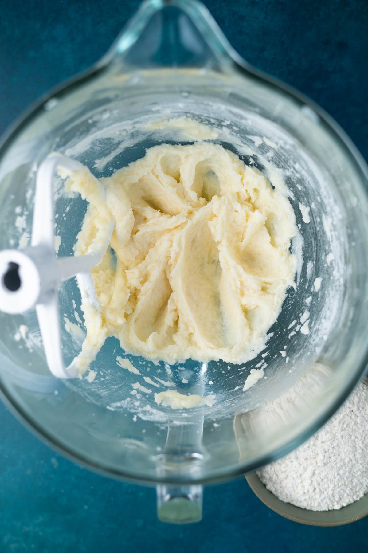 cookie dough after egg and extract has been added in a mixing bowl