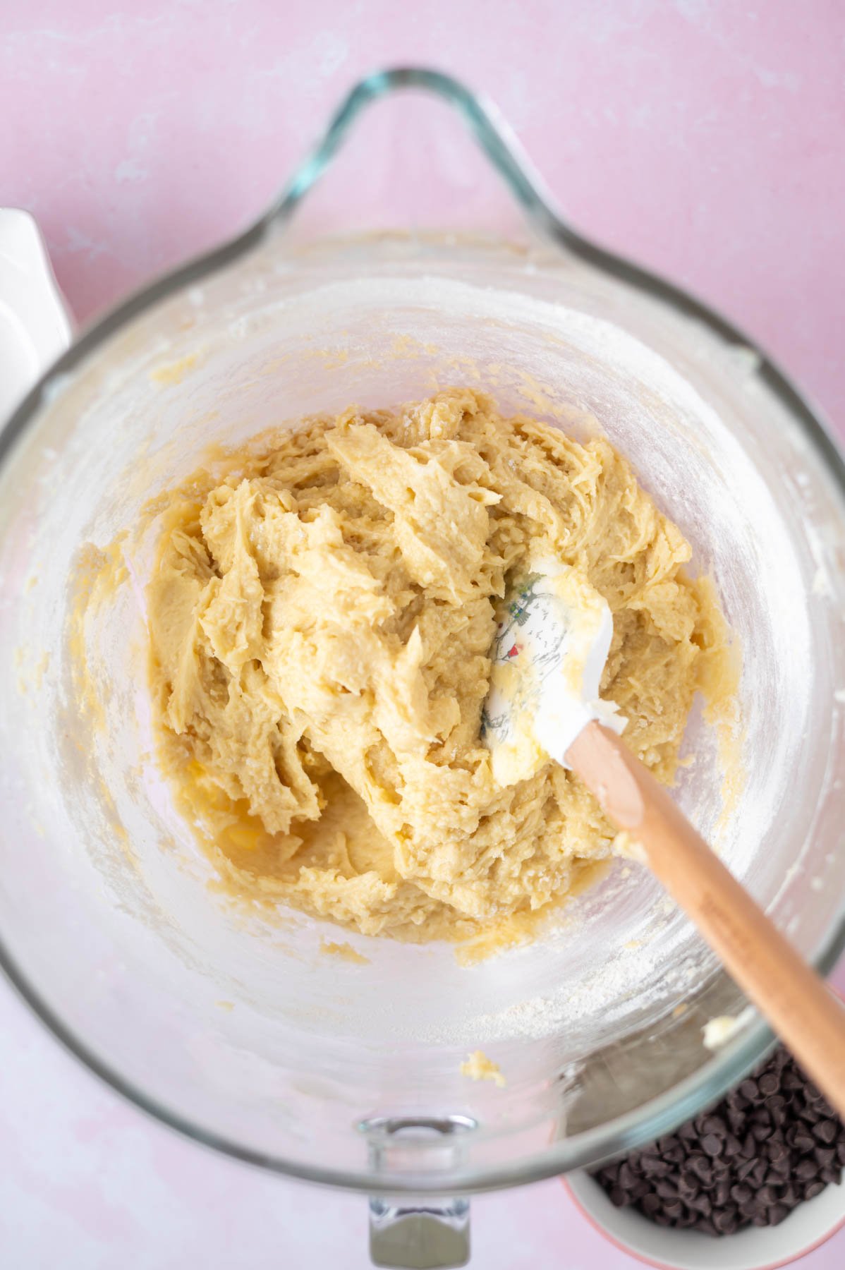 cake batter in a mixing bowl with a spatula