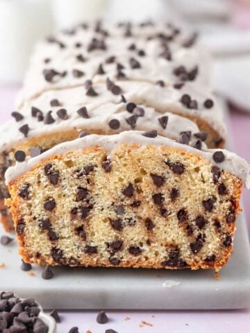 chocolate chip loaf cake slices on a marble board