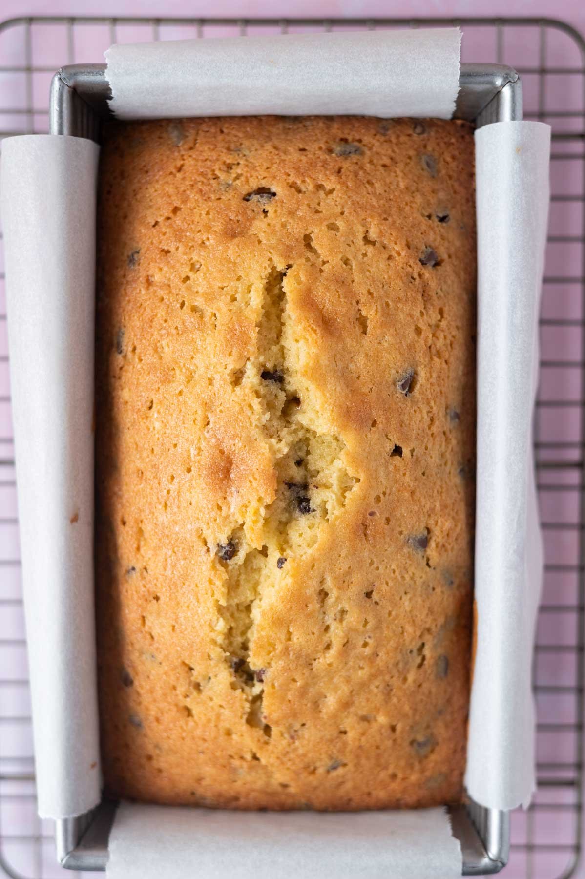 baked pound cake in a parchment lined baking tin