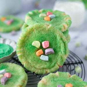 stack of st patrick's day sugar cookies with colored cereal marshmallows