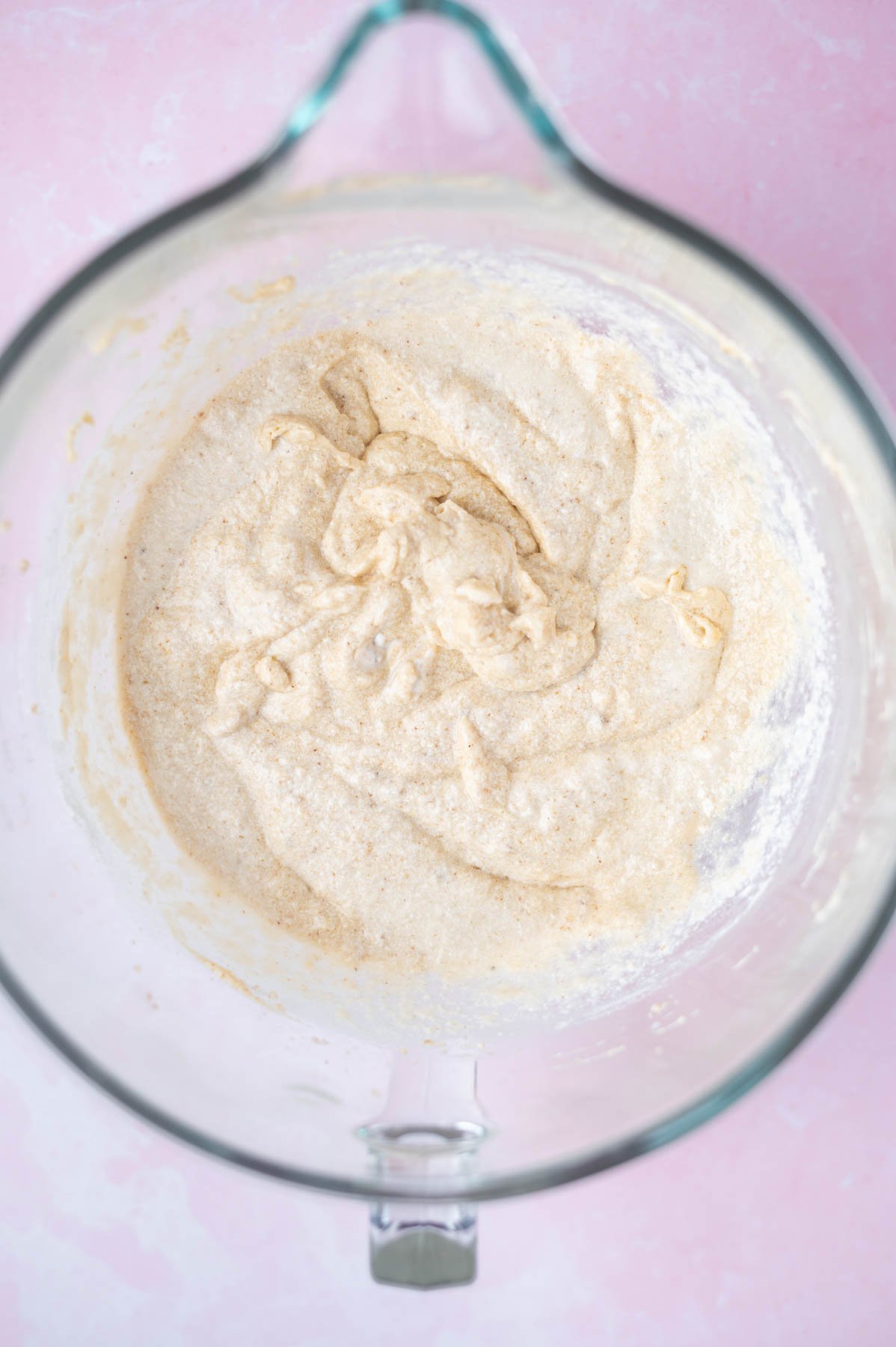 cupcake batter with sour cream and milk mostly mixed in