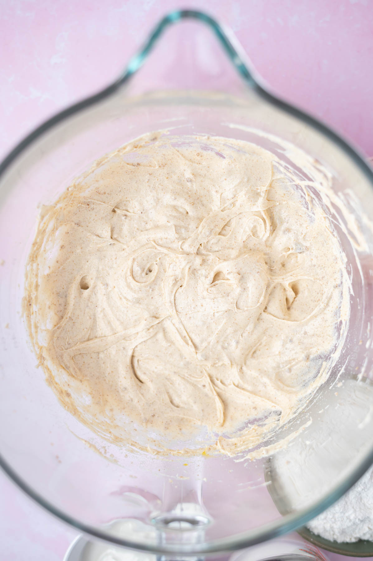 batter in a mixing bowl after the eggs and vanilla have been added