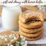 stack of brown butter cookies with a bite missing from the top one next to a glass of milk with text overlay