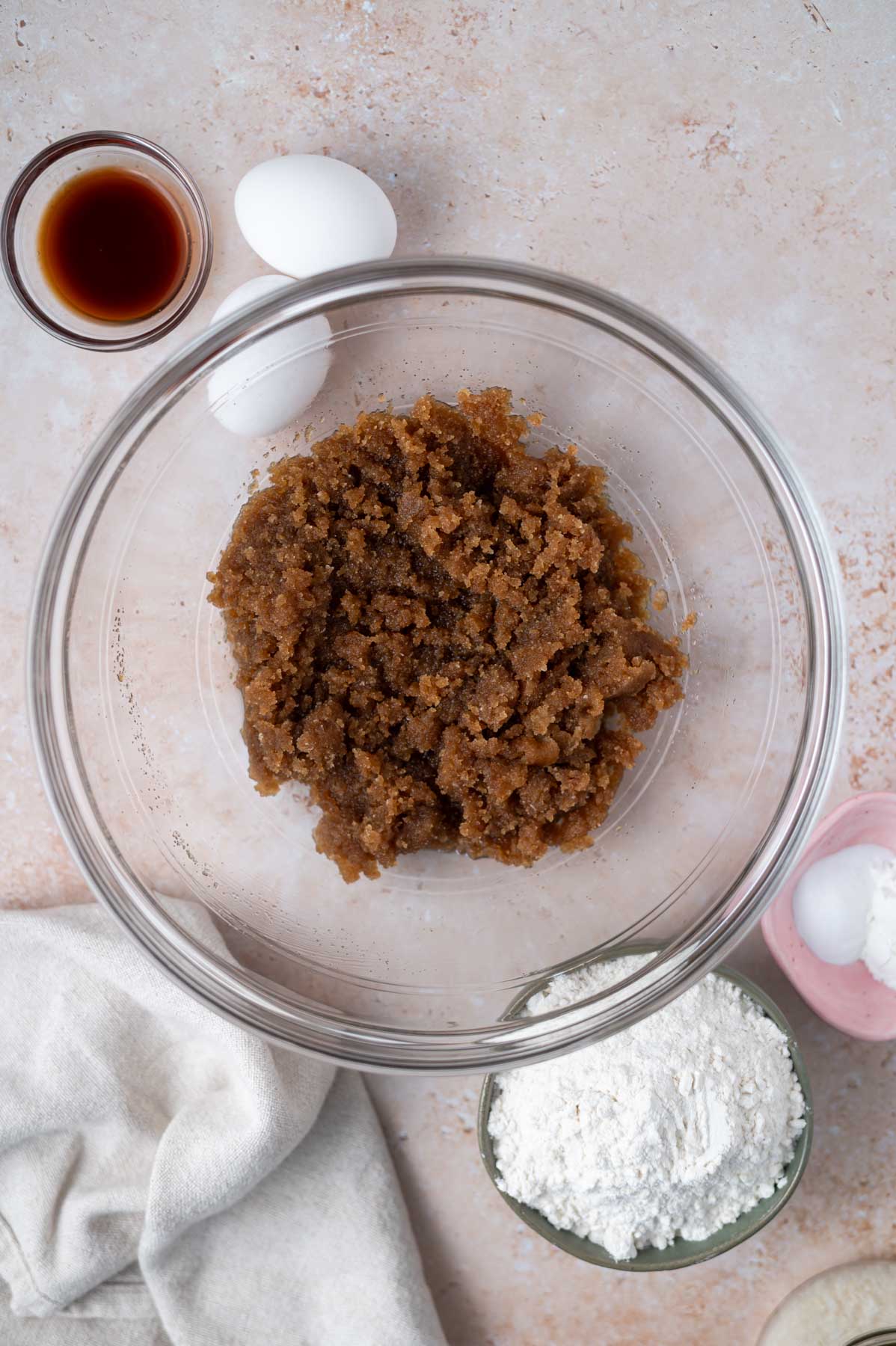 brown butter, granulated and brown sugars mixed together in a glass bowl