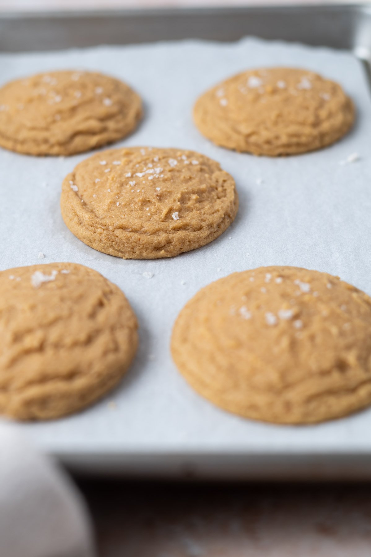 baked cookies with flaky sea salt sprinkled on top