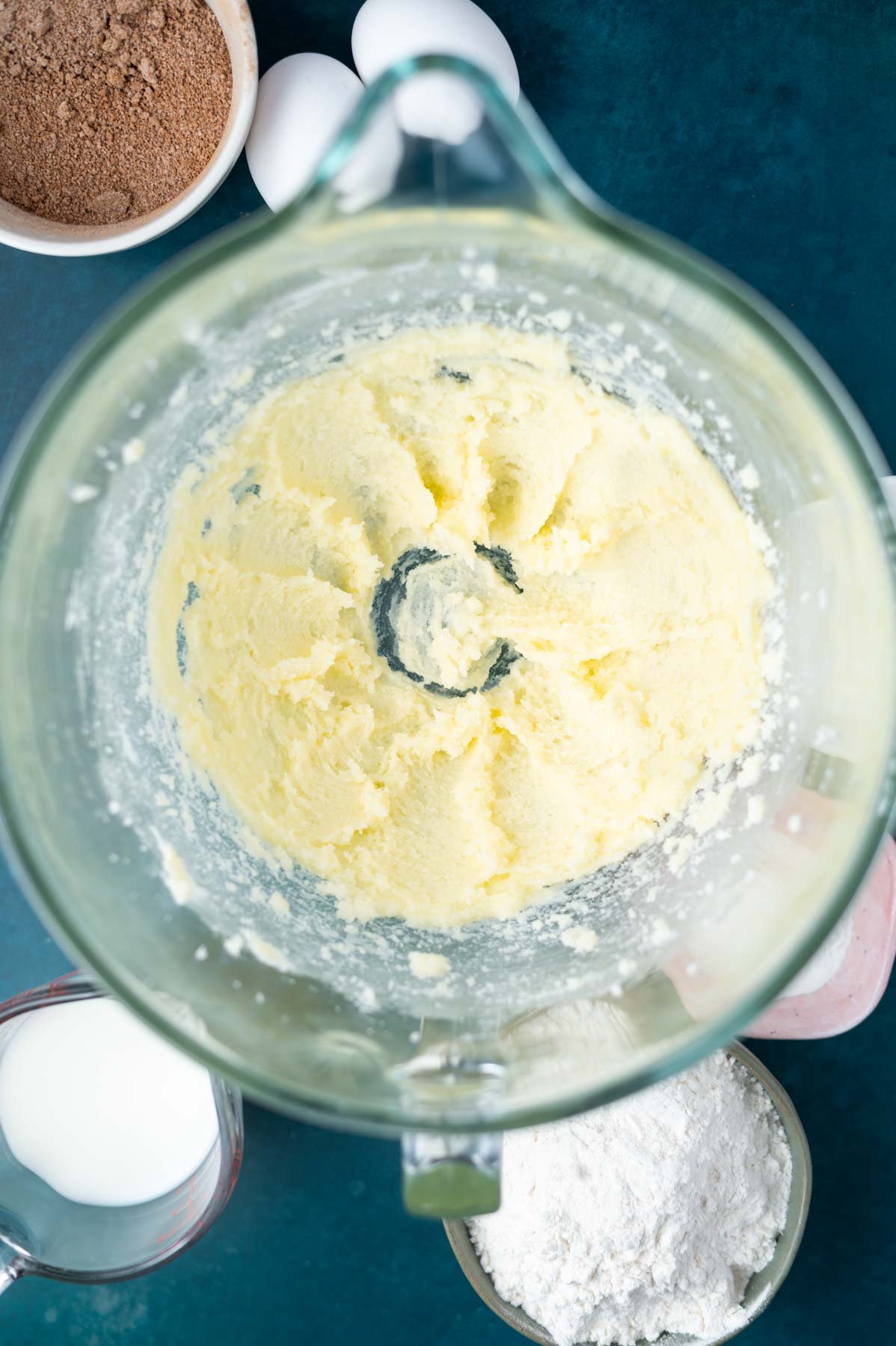 butter and sugar creamed together in a mixing bowl