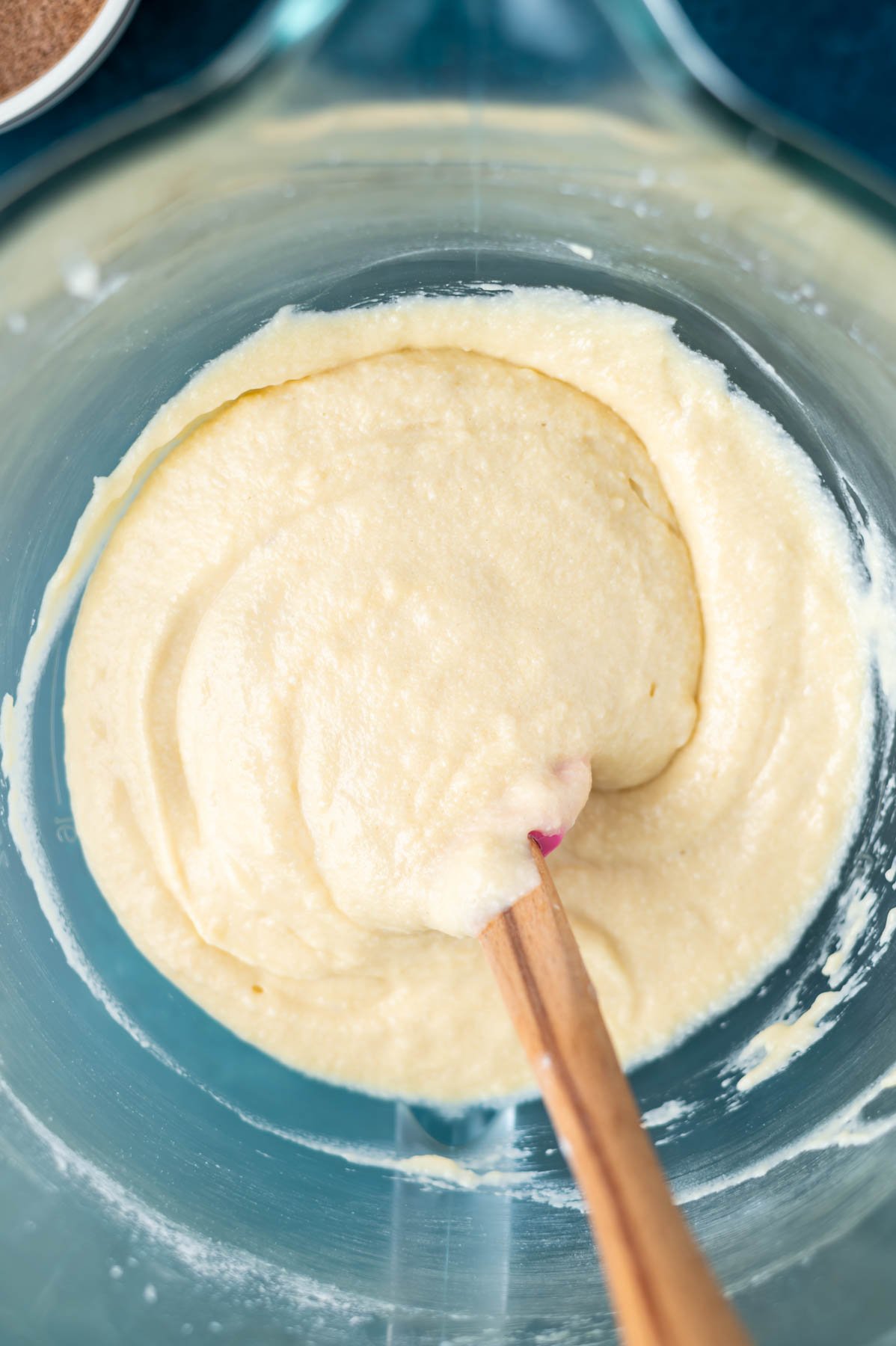 cake batter in a bowl with a spatula