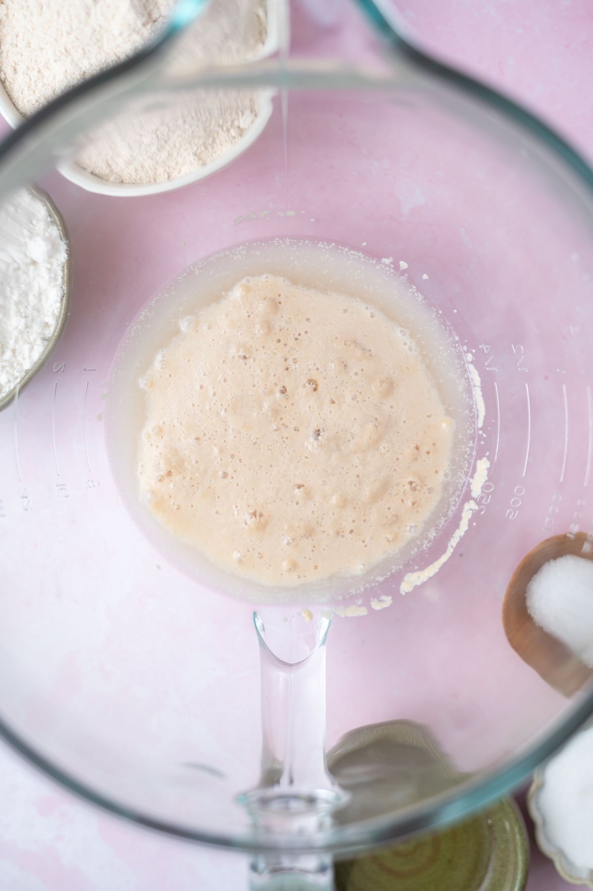 yeast activated to being foamy and bubbly in a mixing bowl