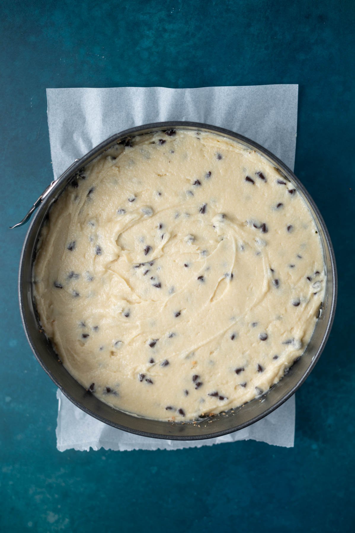 cannoli cake batter in a springform pan