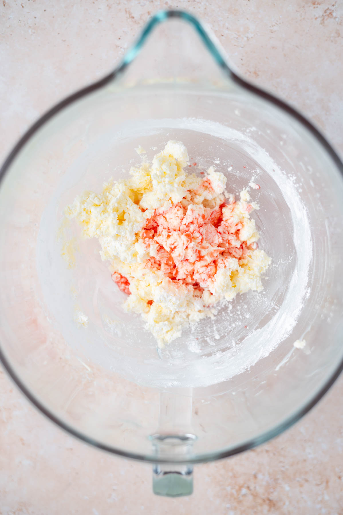 maraschino cherry juice over butter in a mixing bowl