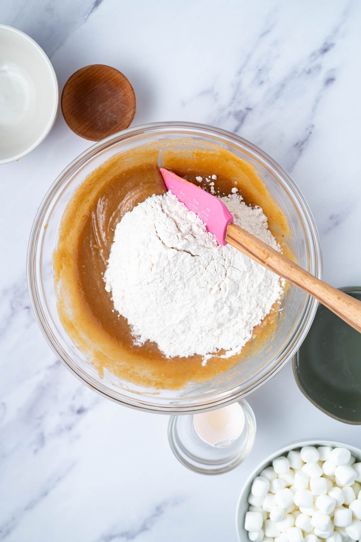 flour added to bowl of fluffernutter bars dough