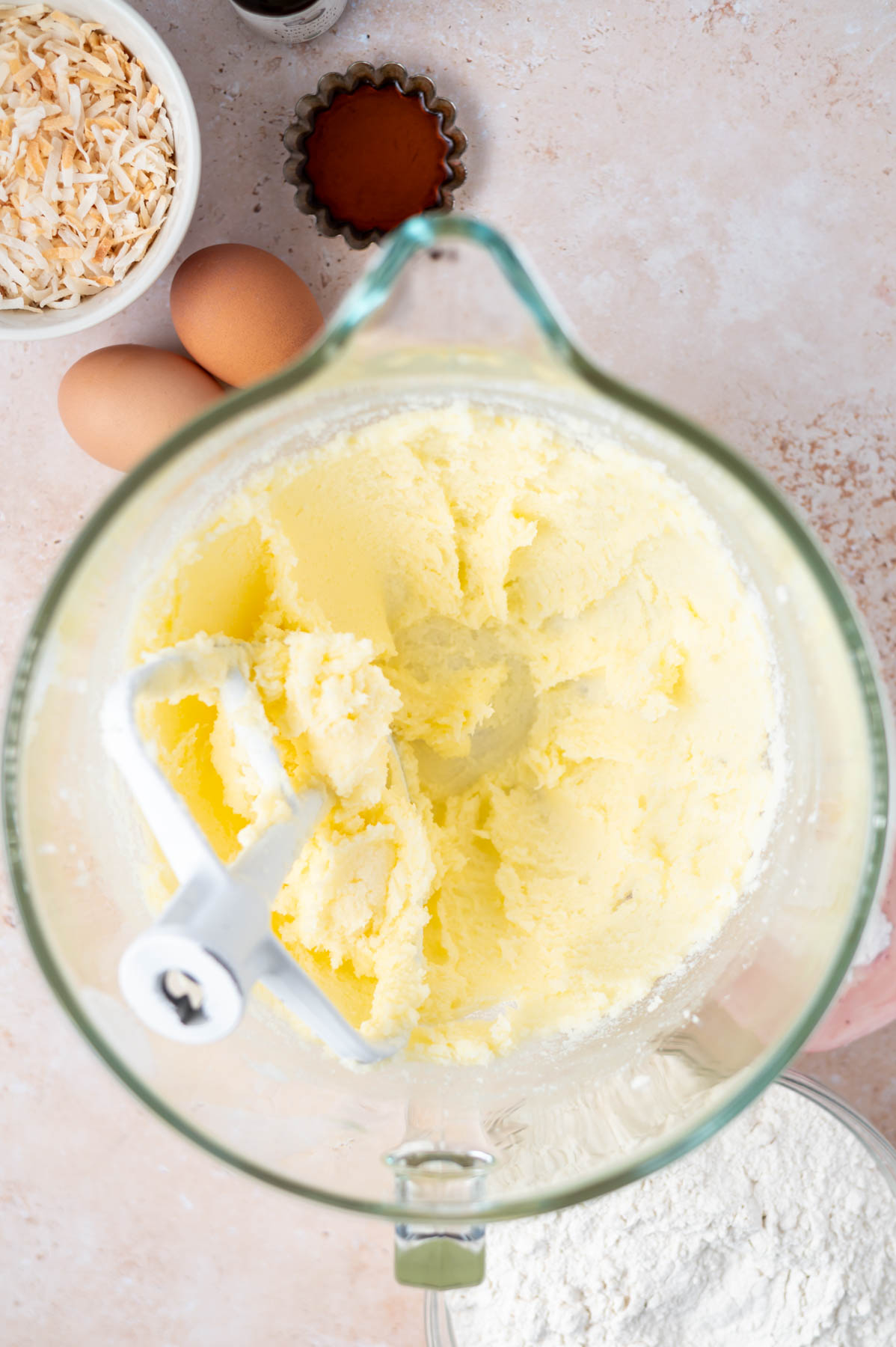 butter and white sugar beaten together in a mixing bowl