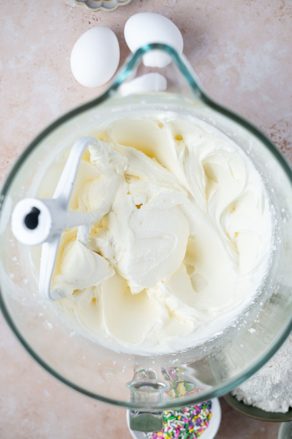 cake batter after sour cream has been added in mixing bowl