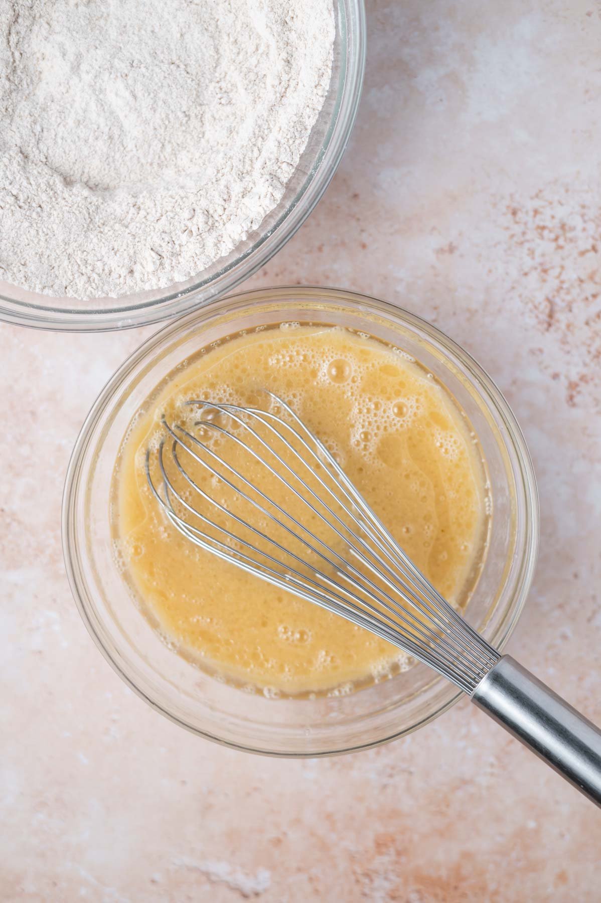 wet ingredients whisked together in a mixing bowl