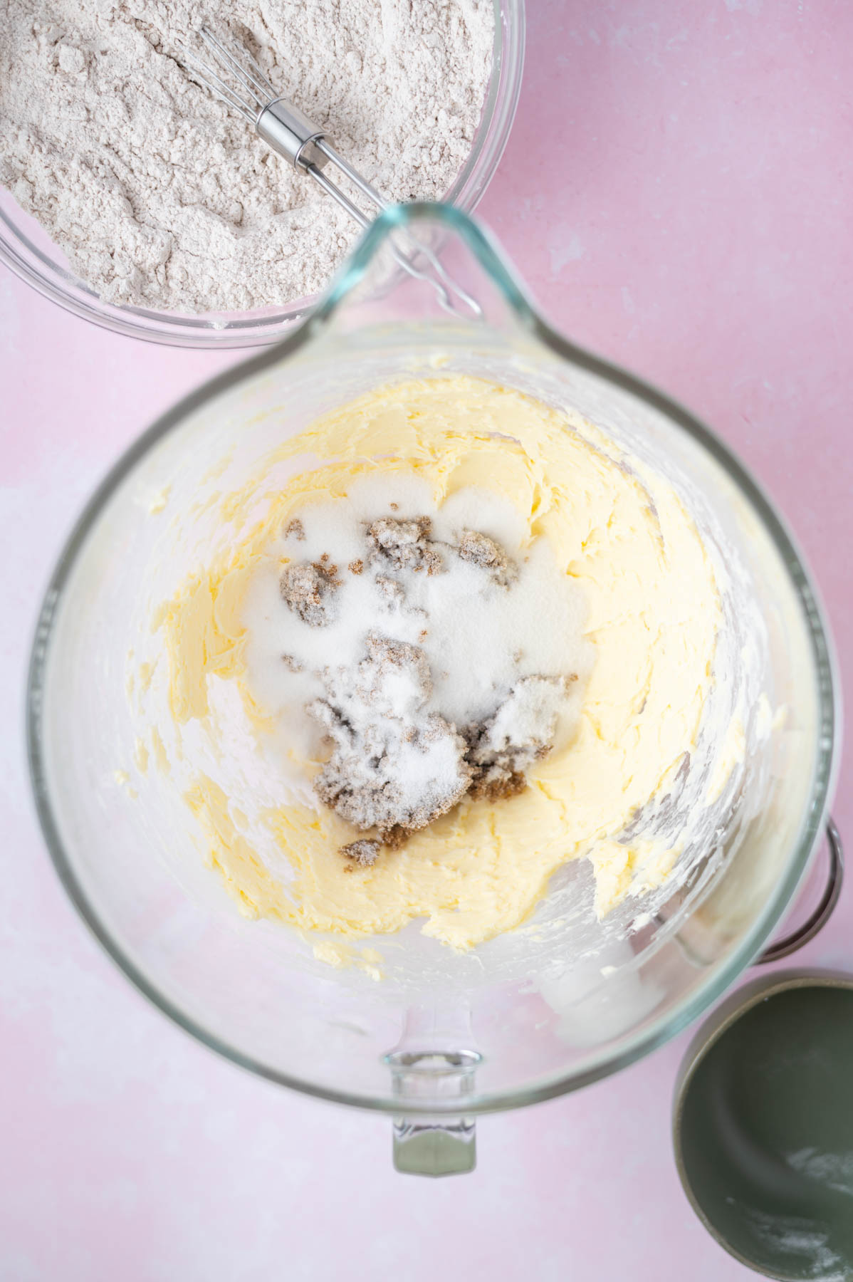 creamed butter in a mixing bowl with brown and white sugar added