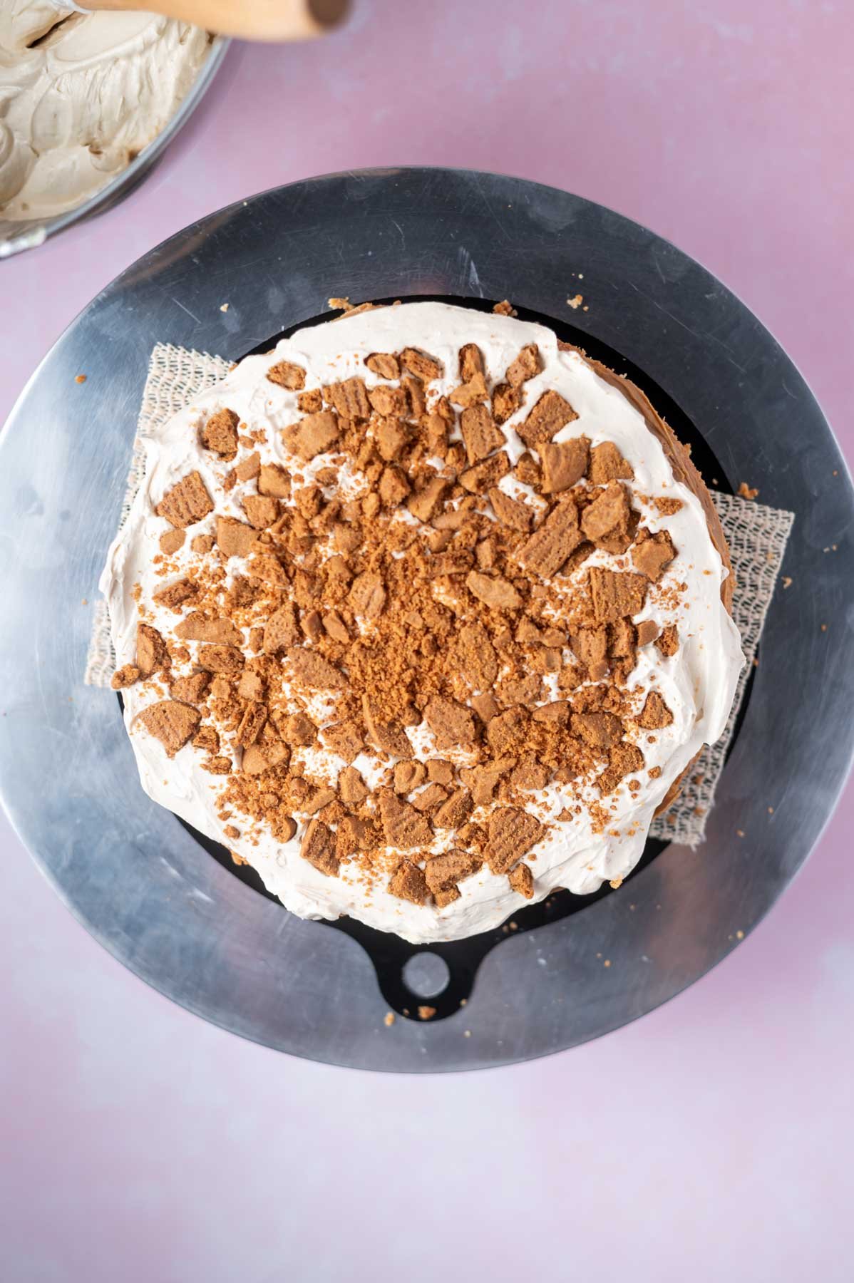 cookies pressed into frosting for cake filling