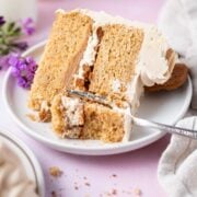 slice of cookie butter cake on a plate with a fork