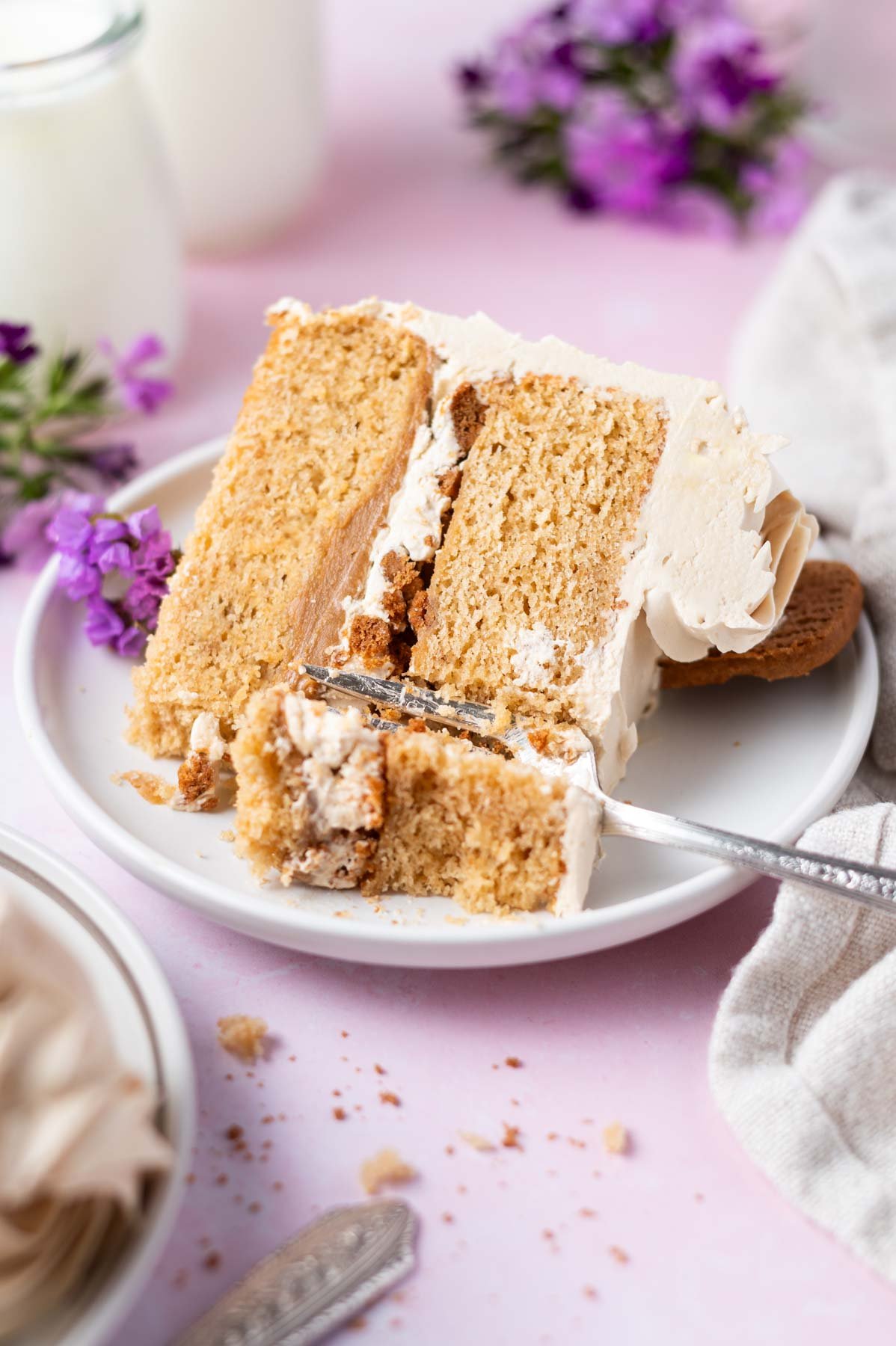 slice of cake on a plate with a fork