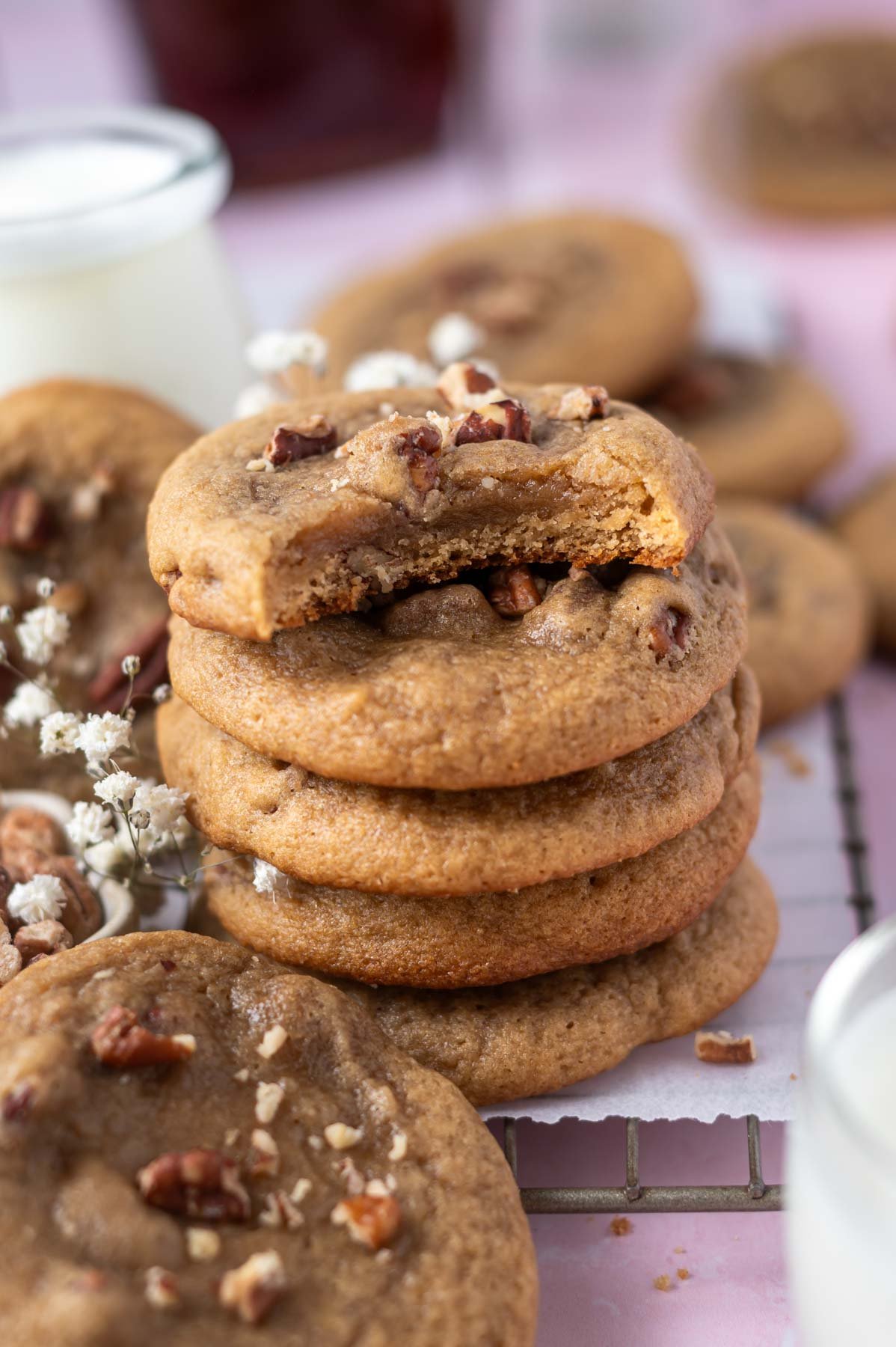 stack of cookies with the top one missing a bite