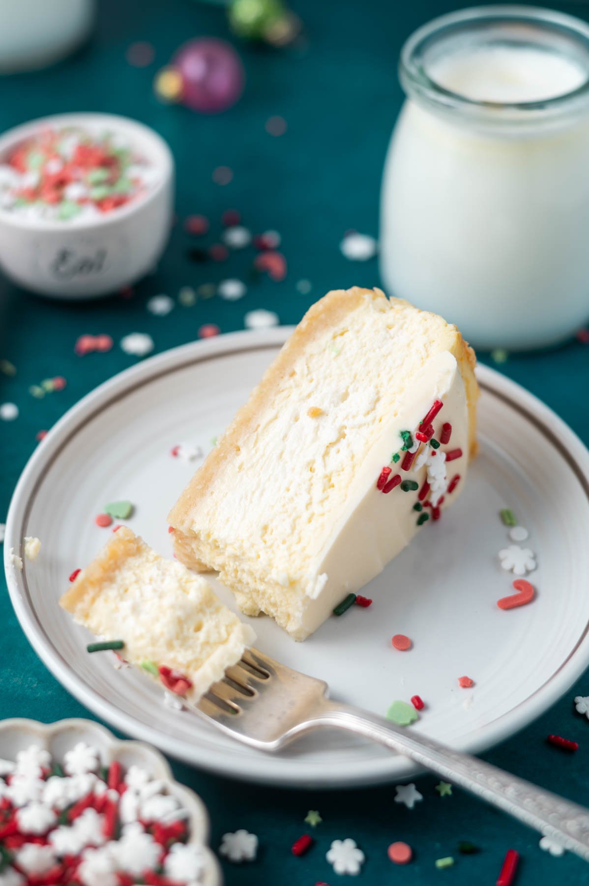 slice of cheesecake on a plate with a fork
