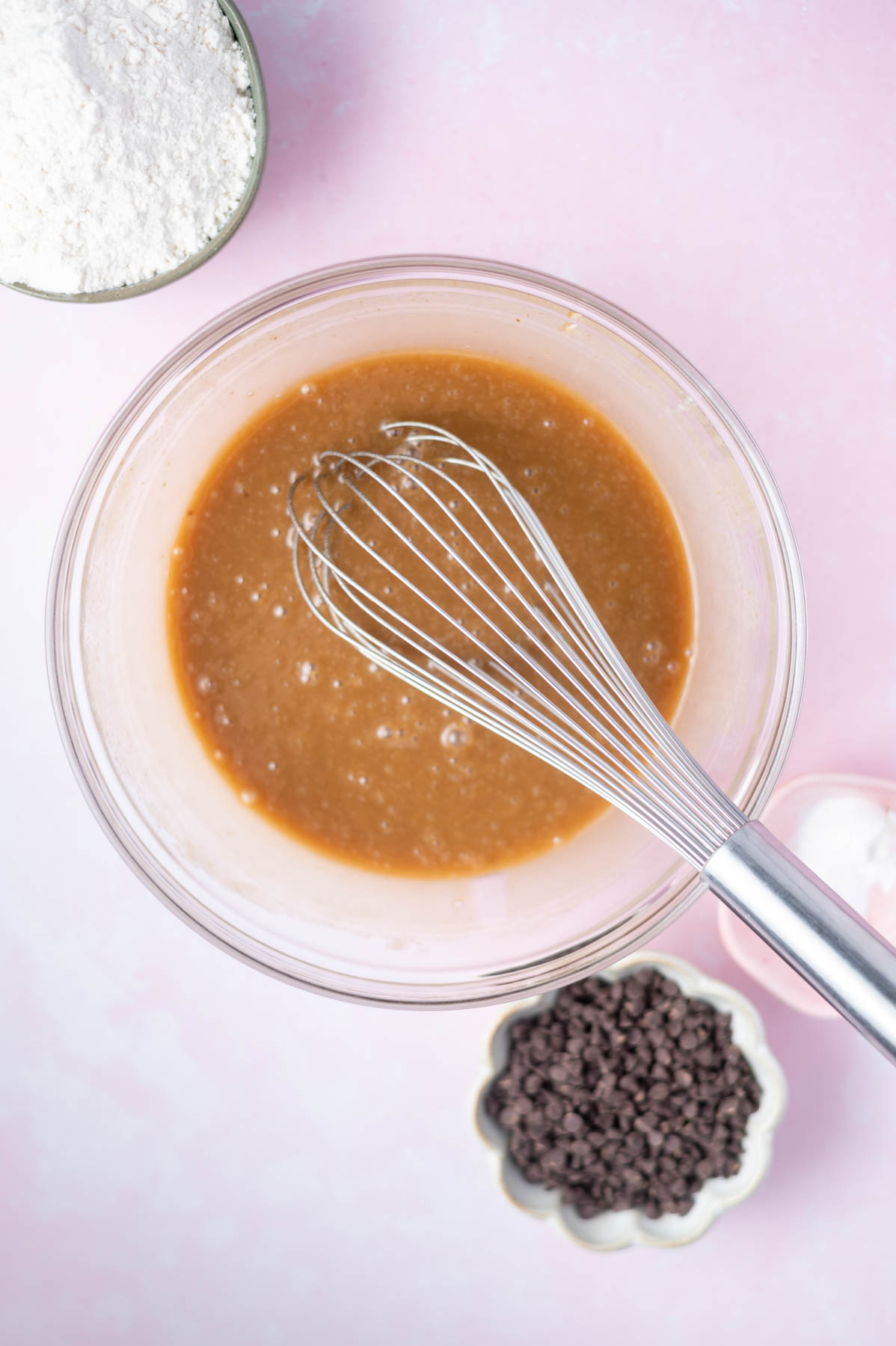 wet ingredients whisked together in a glass bowl