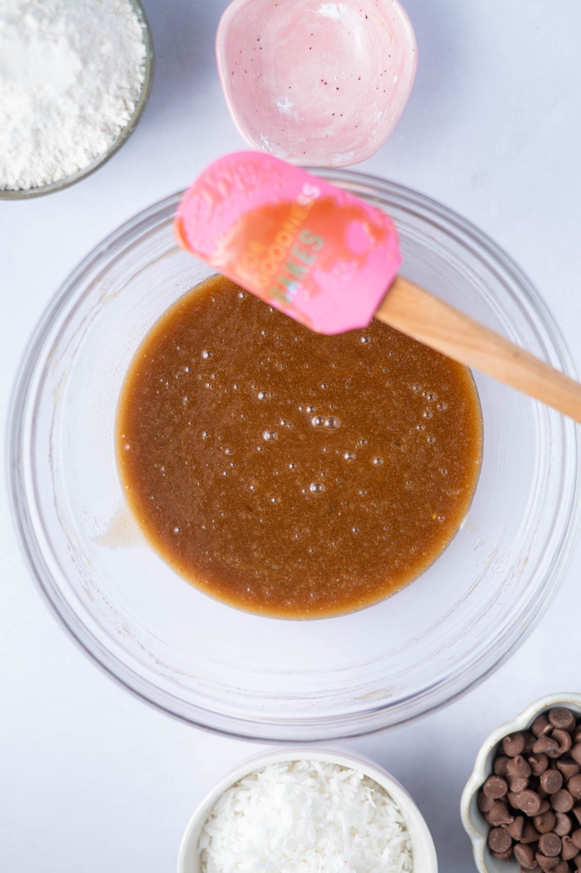 wet cookie dough ingredients mixed together in a bowl