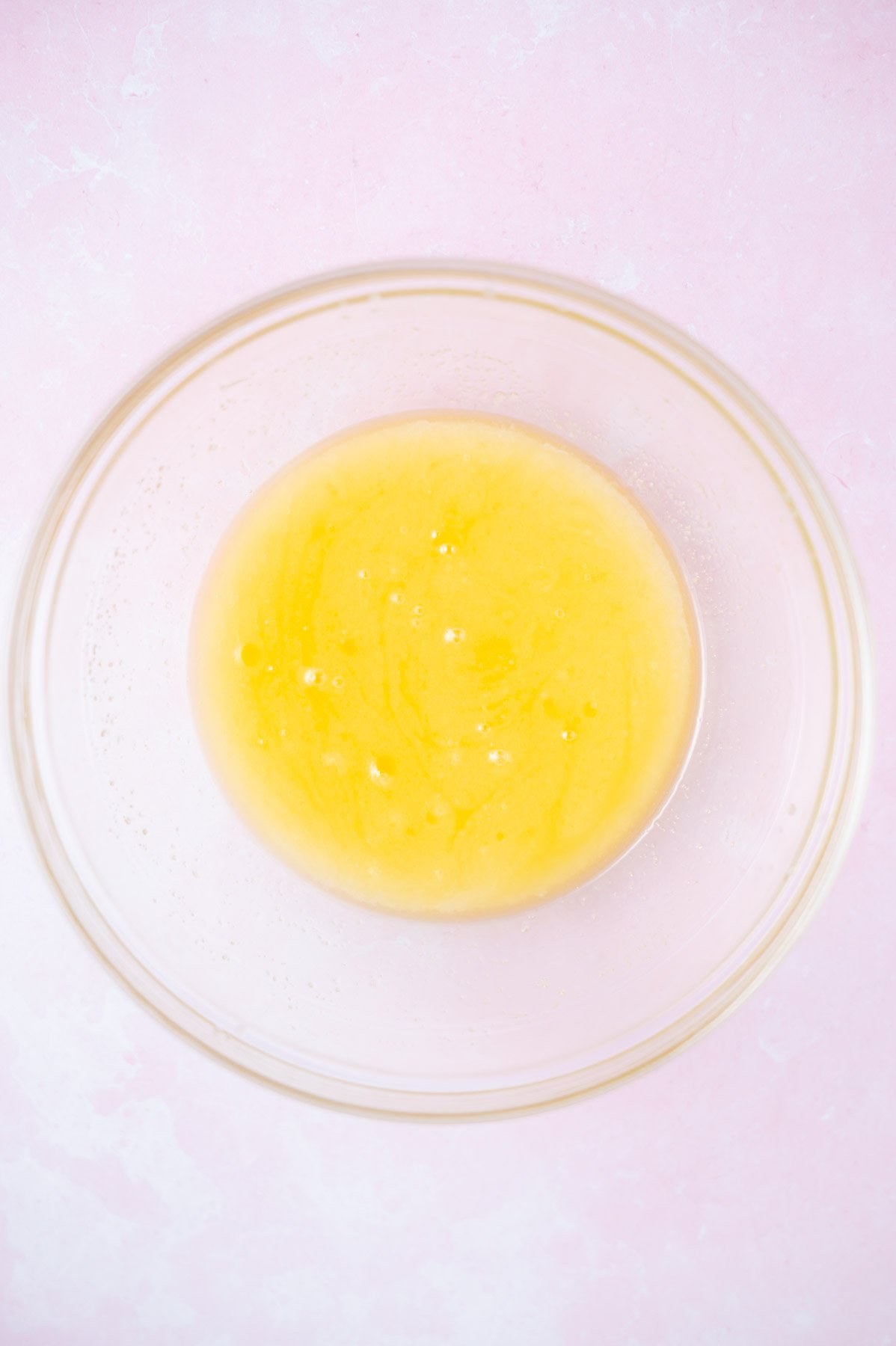 melted butter and sugar mixed together in a bowl