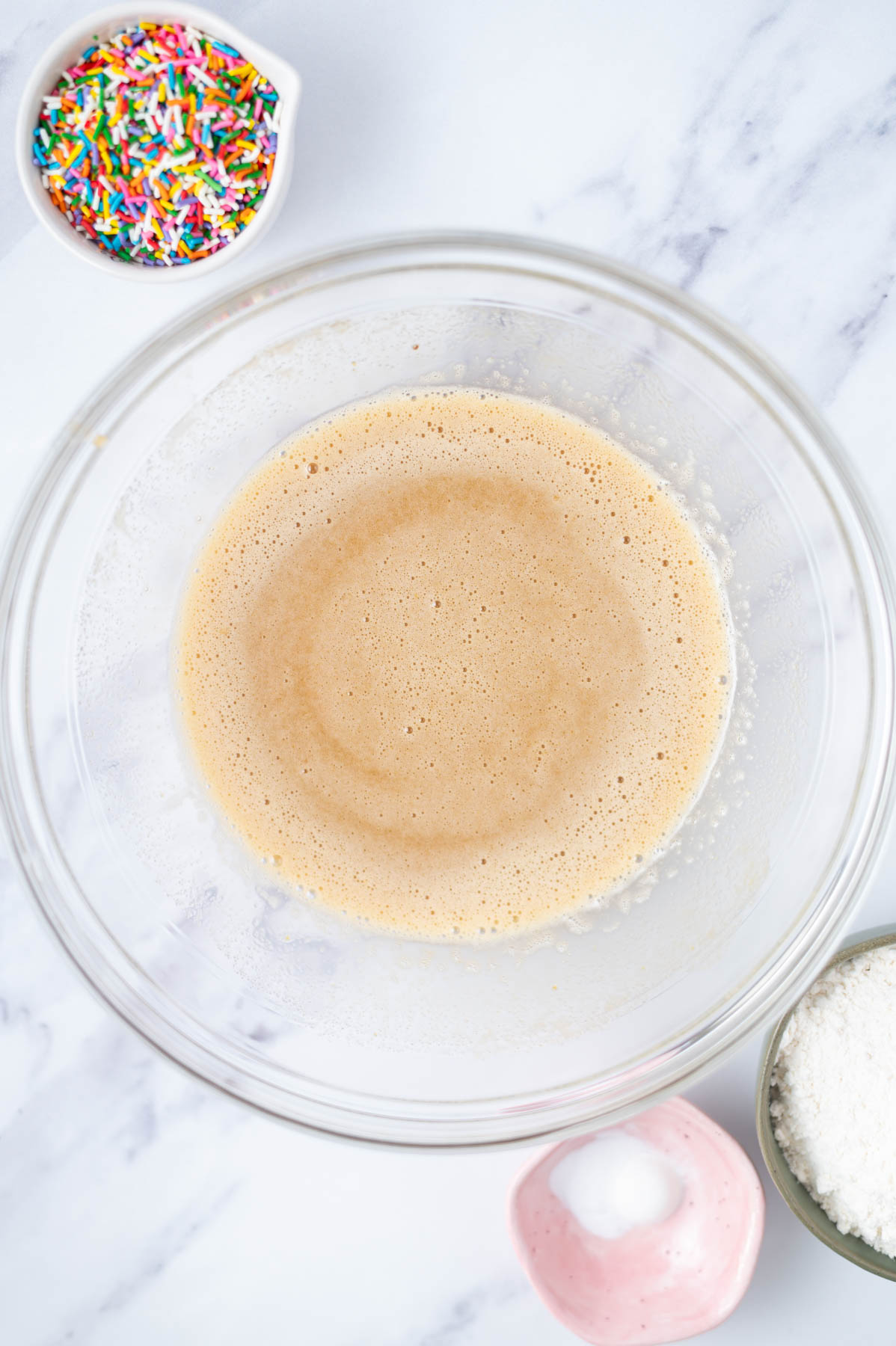 wet ingredients mixed together in a glass bowl