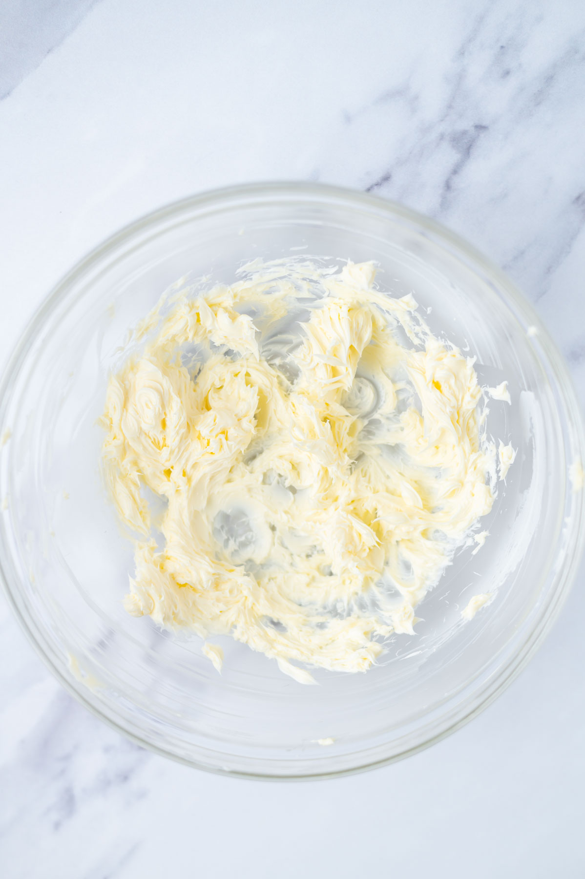 butter creamed together in a glass bowl