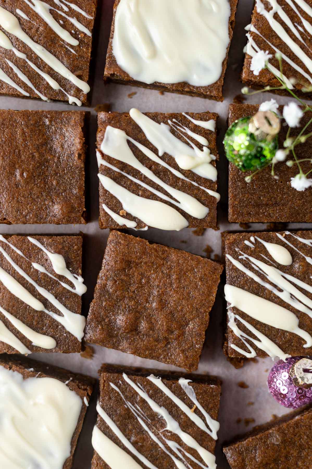 overhead look at gingerbread blondies - some dipped in white chocolate, some drizzled and some plain