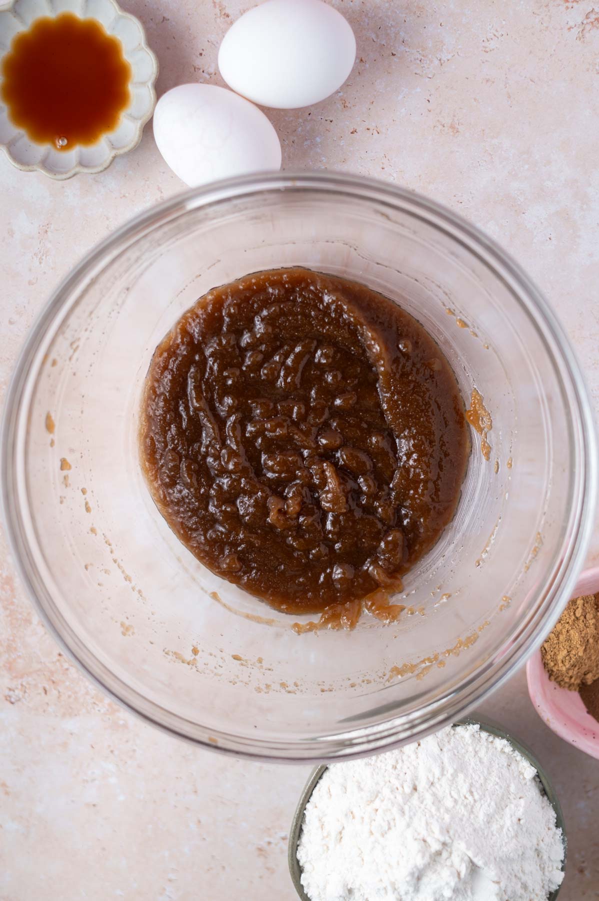 melted butter and sugars whisked together in a glass bowl
