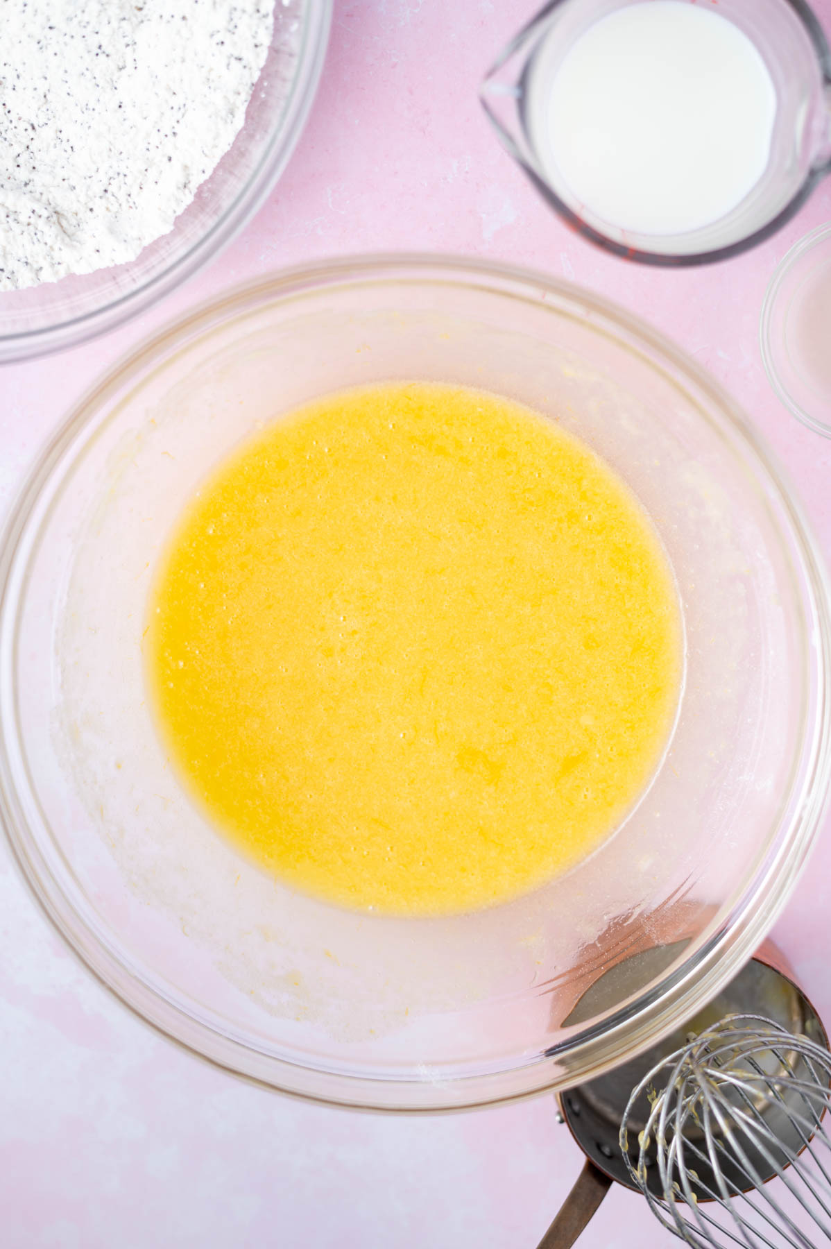 sugar and wet ingredients whisked together in a bowl