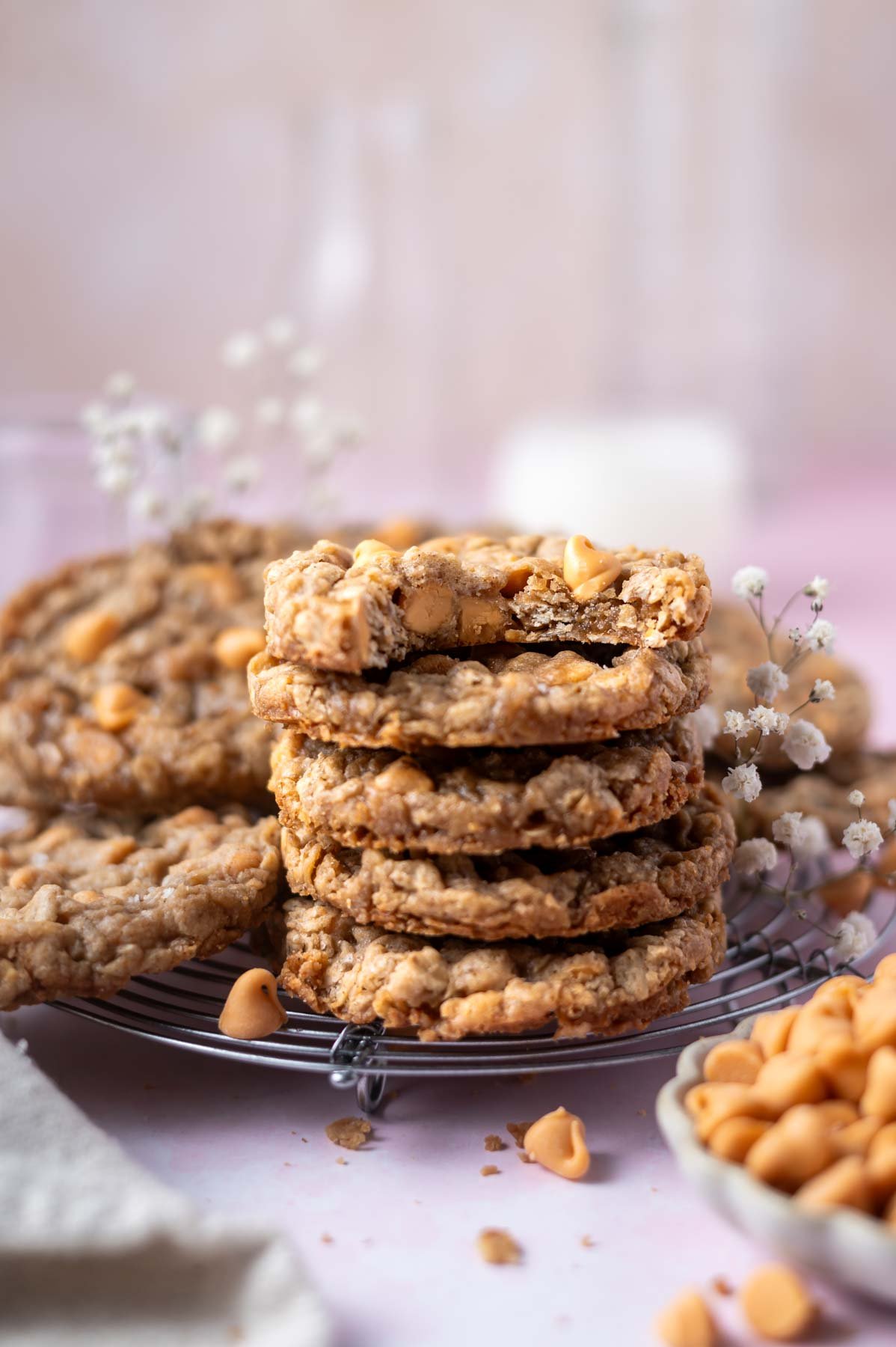 stack of cookies with the top one missing a bite