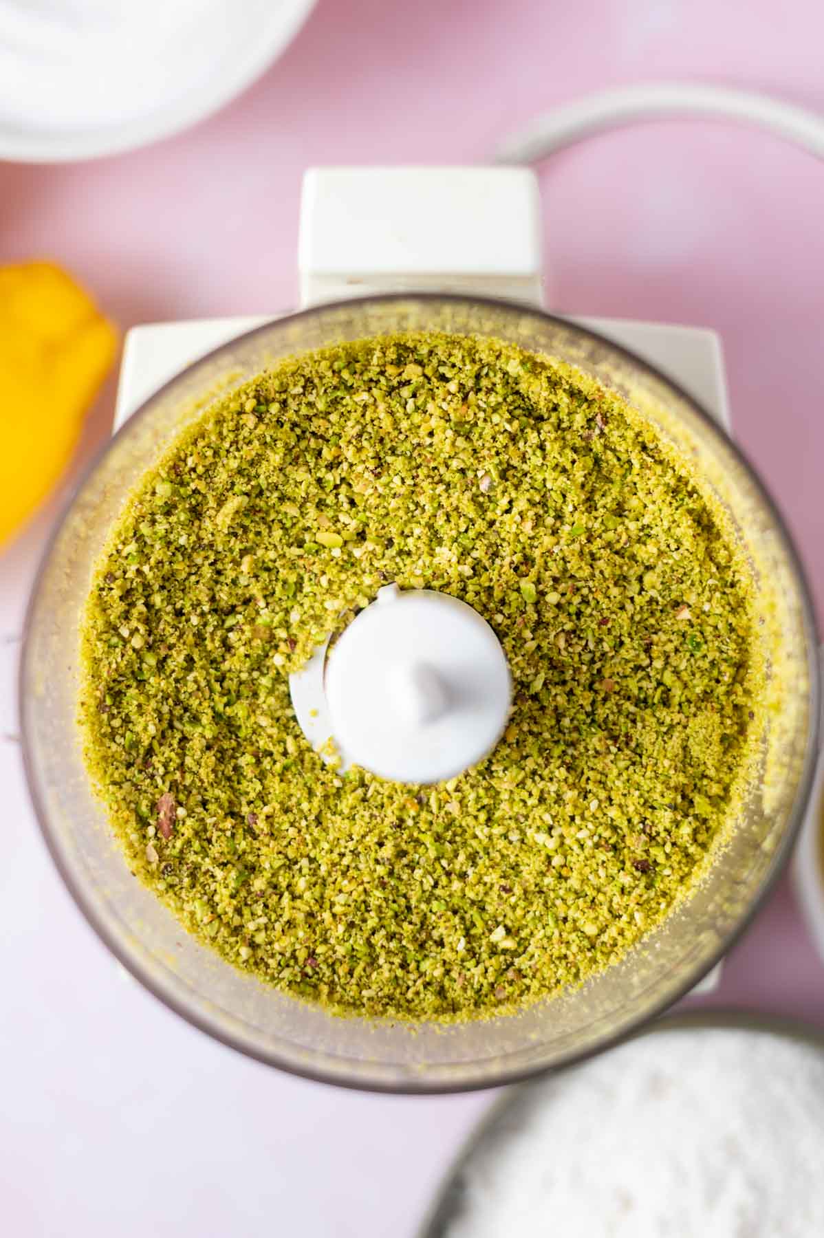 ground pistachios in a food processor bowl
