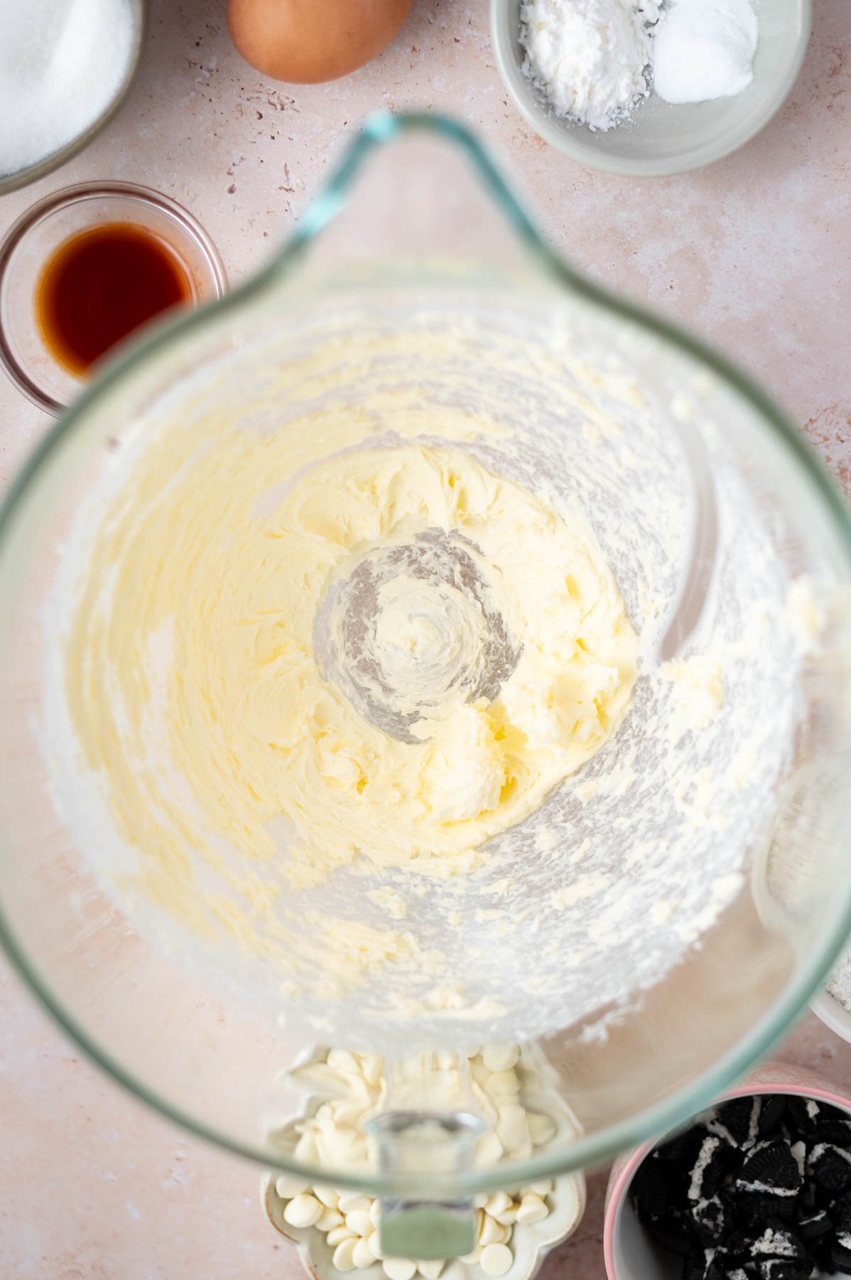 butter and salt creamed together in a glass mixing bowl