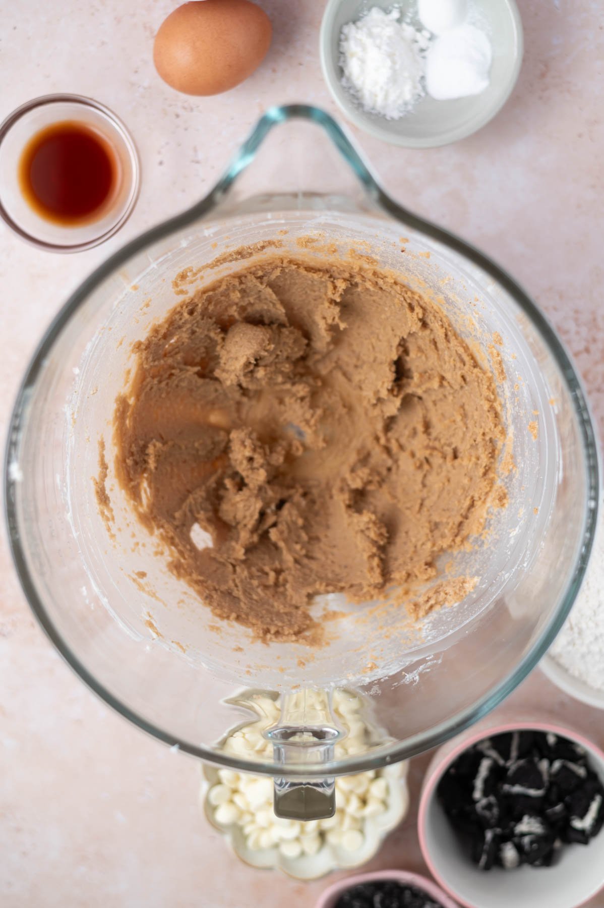 butter and sugars creamed together in a mixing bowl