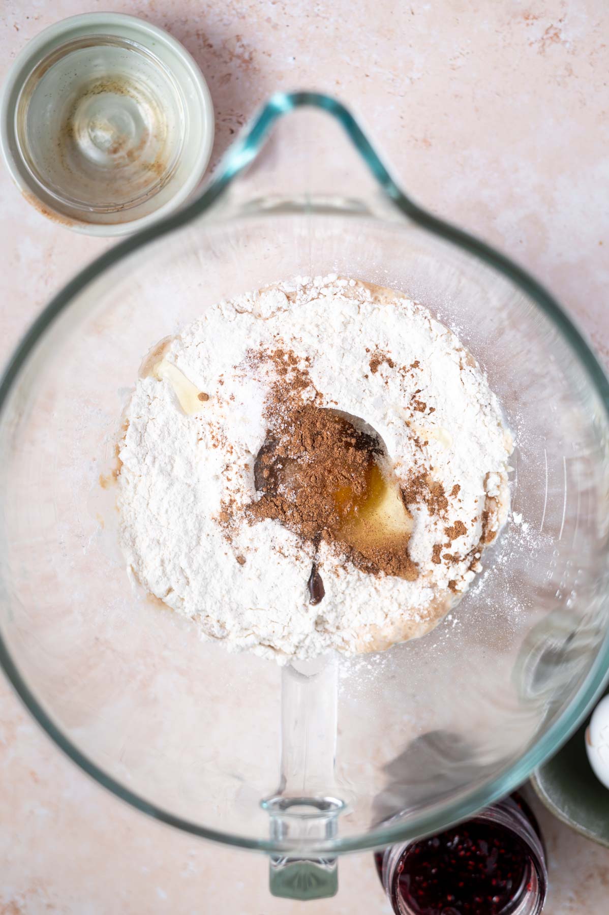 flour, egg, nutmeg and salt added to yeast in a mixing bowl
