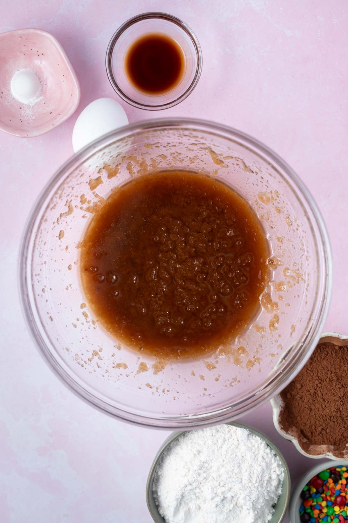 melted butter, sugars and salt whisked together in a bowl