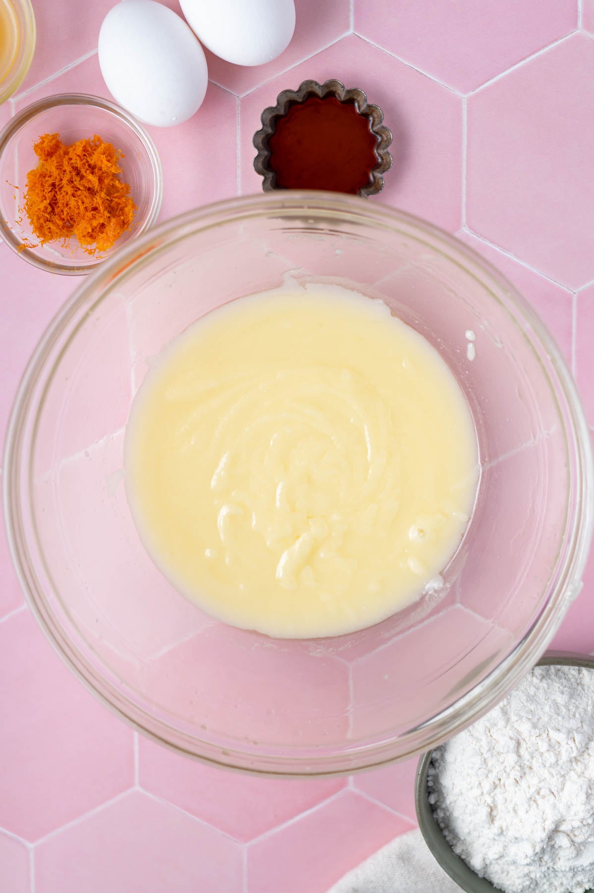 sugars and butter whisked together in a glass bowl