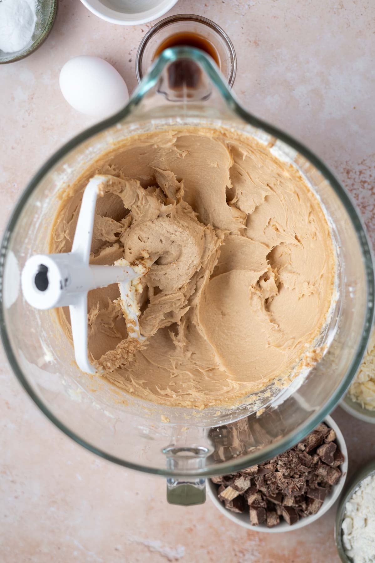 brown and white sugars beaten into butter and cream cheese in a mixing bowl