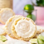 margarita cookies leaning on each other with glaze and sea salt on top