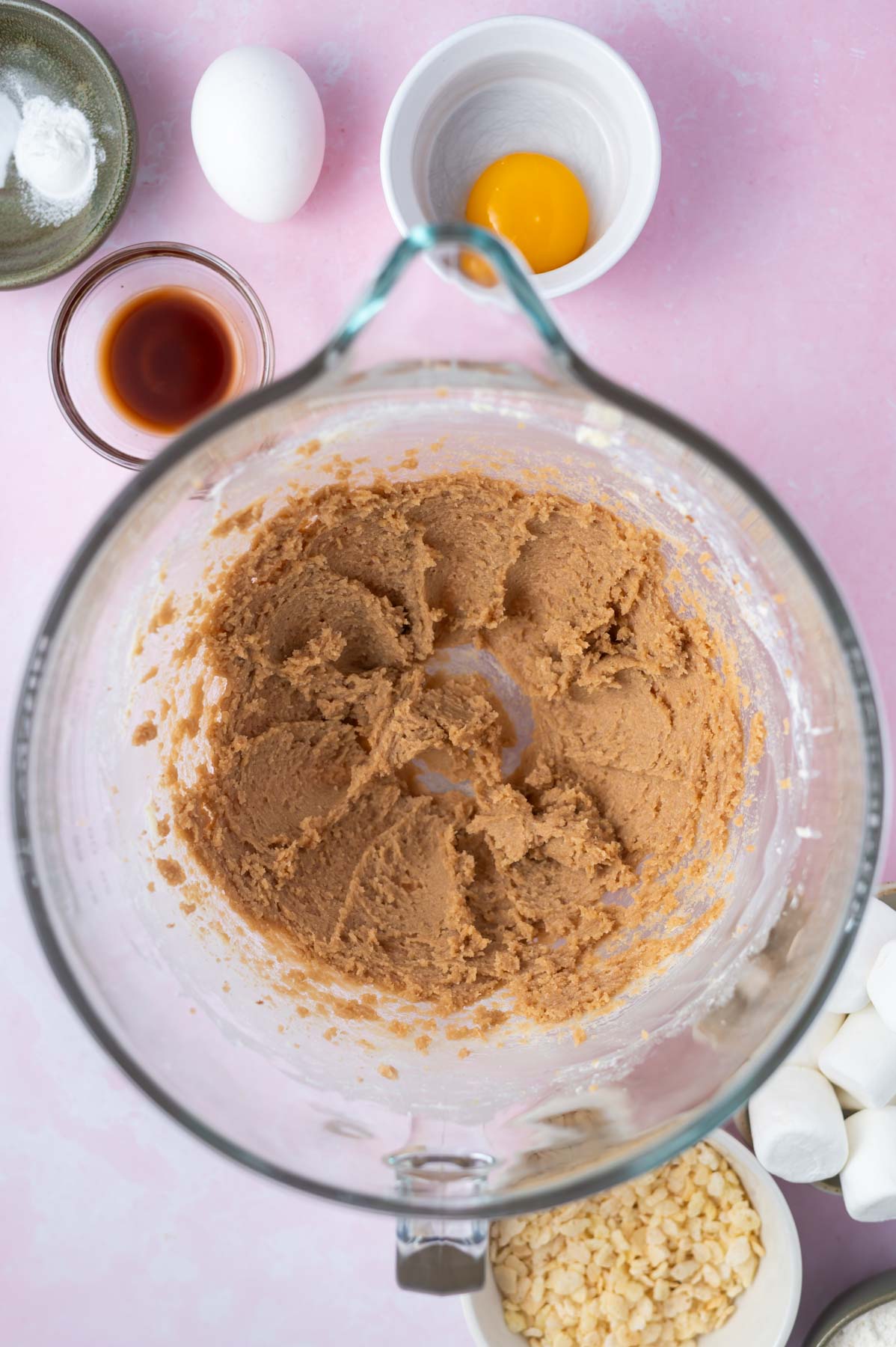brown and white sugar creamed with butter in a mixing bowl