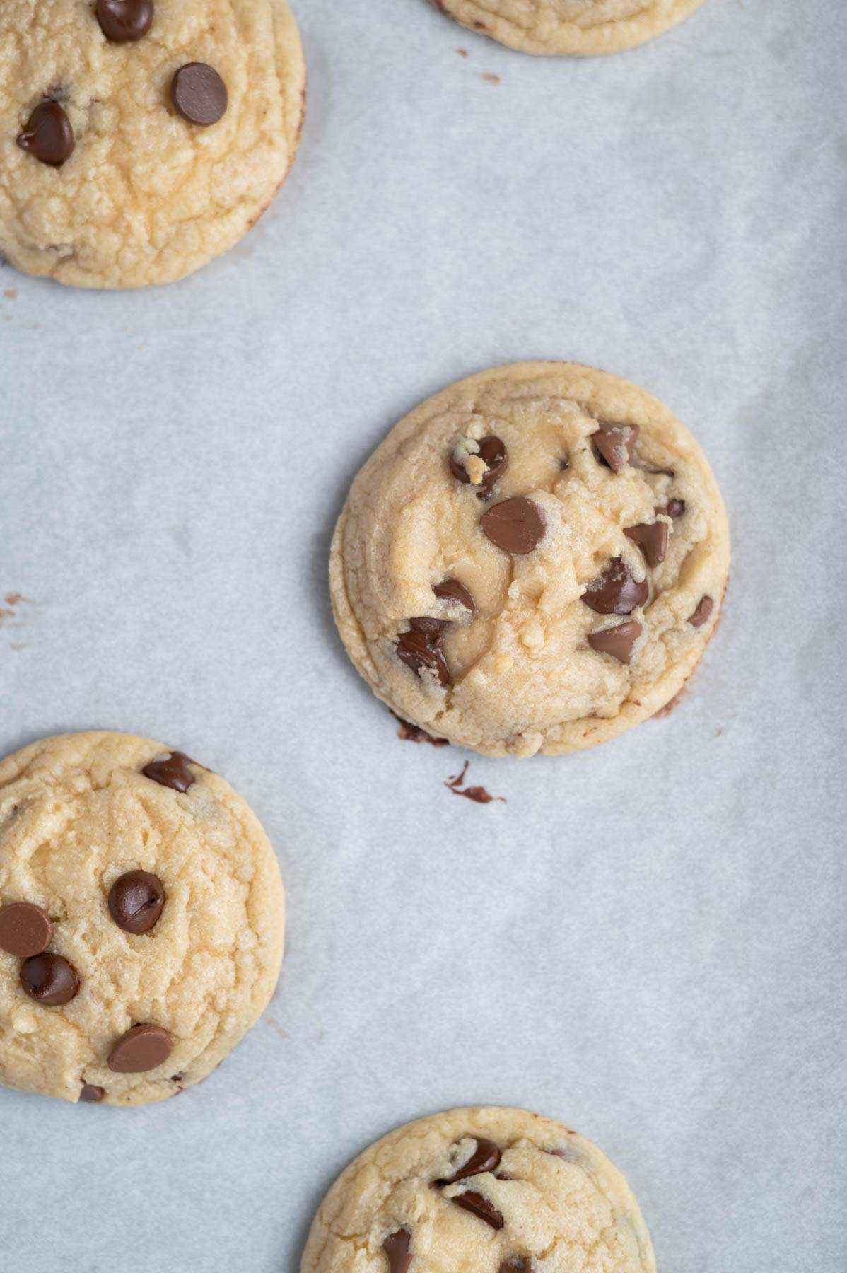 baked cookies on a parchment lined baking sheet