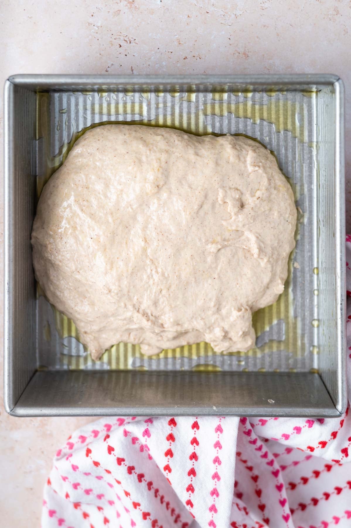 dough in an oil lined baking pan