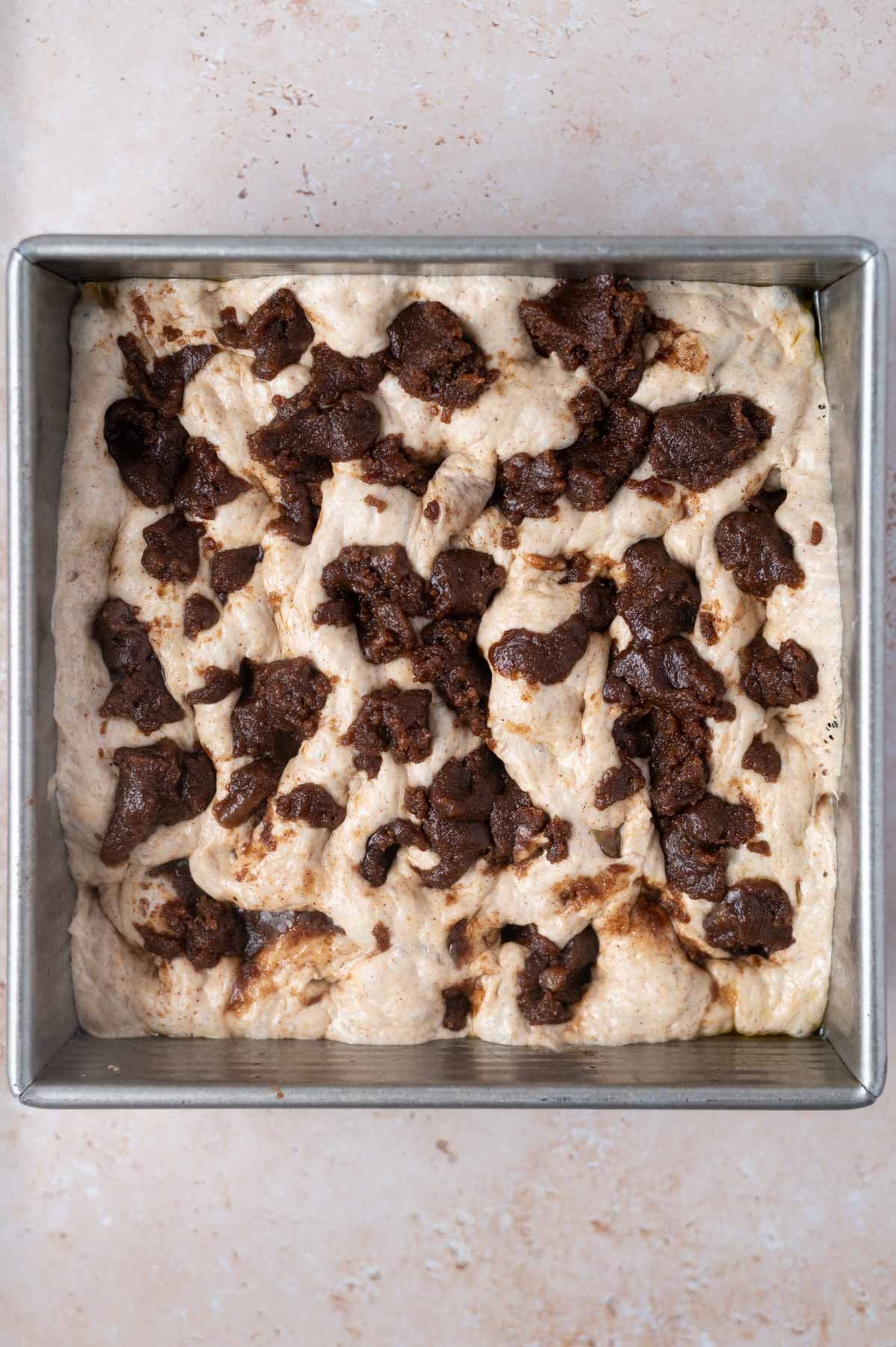focaccia dimpled with cinnamon crumble over the top