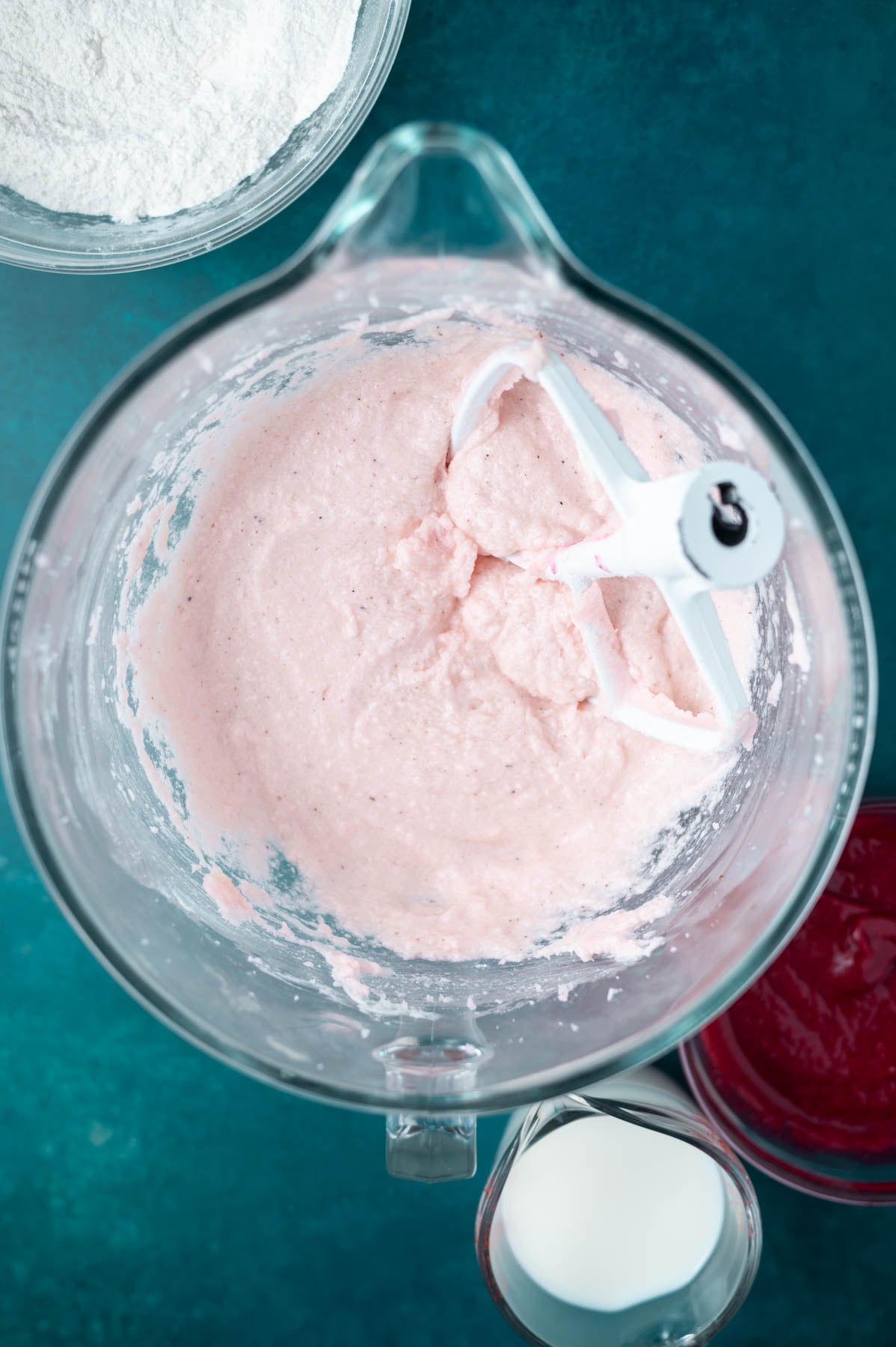 cake batter in a mixing bowl after eggs and extracts have been added