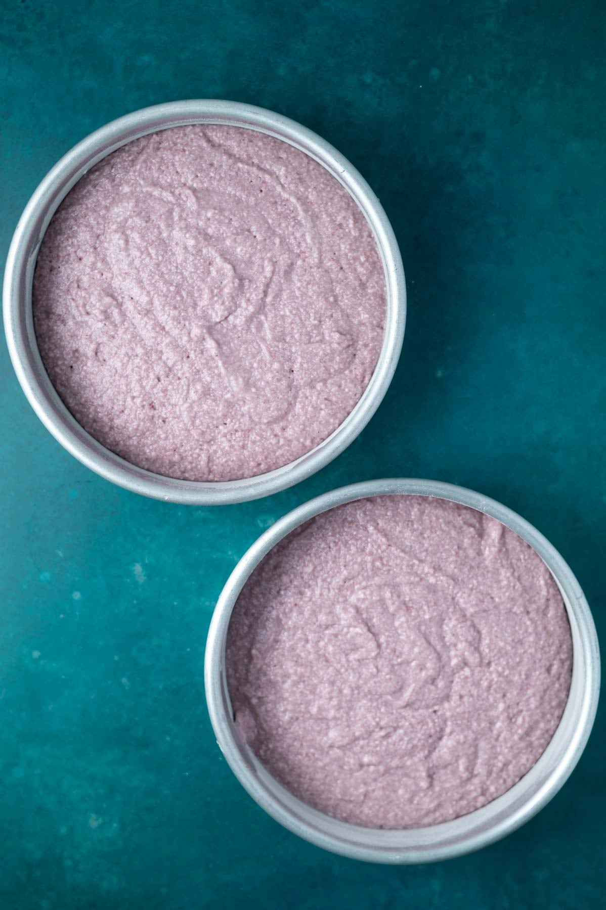 cake batter in cake pans