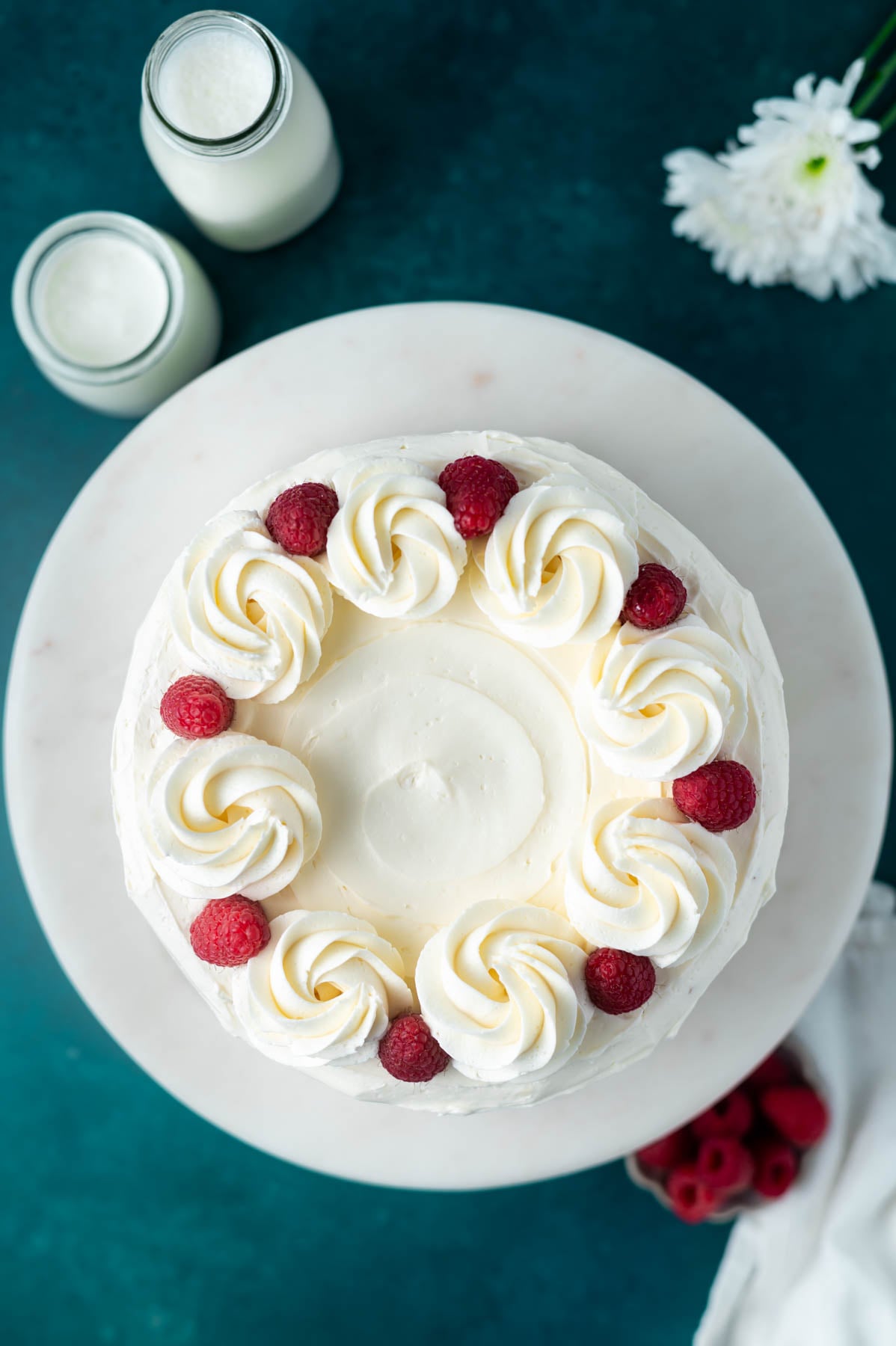 overhead look at decorated cake on a plate stand